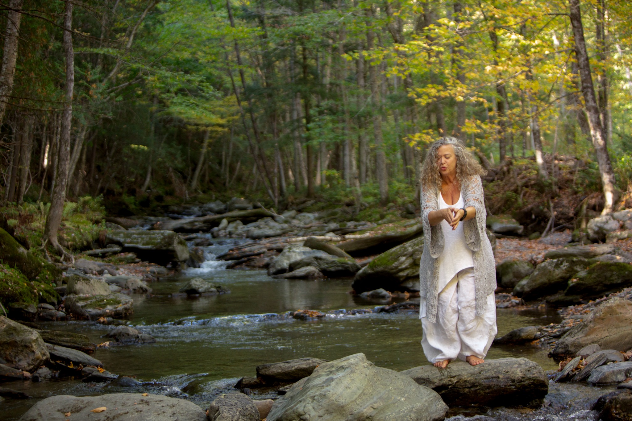 Maira by a forest stream